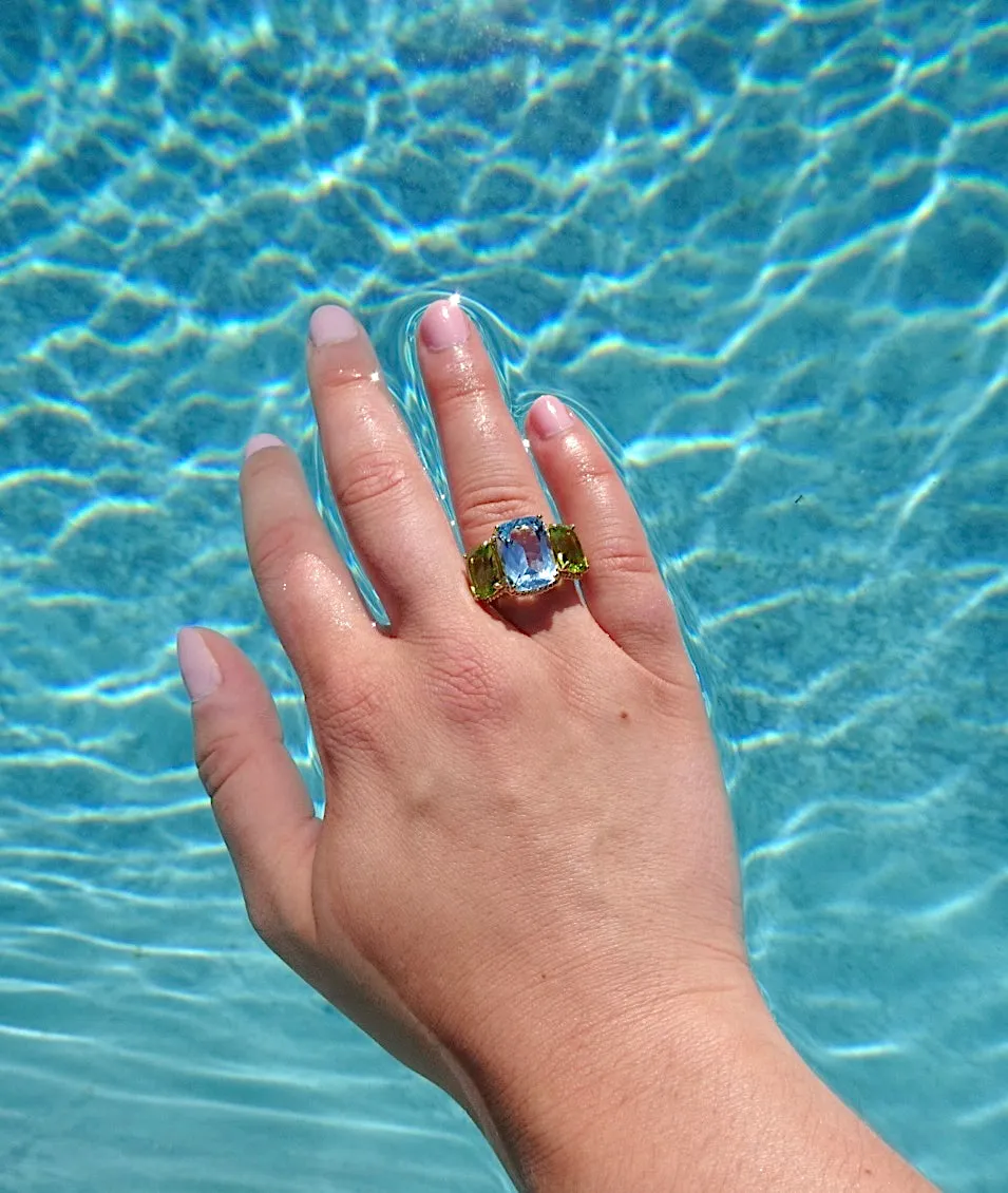 Elegant Three-Stone Ring with Gold Rope Twist Border with Blue Topaz and Peridot