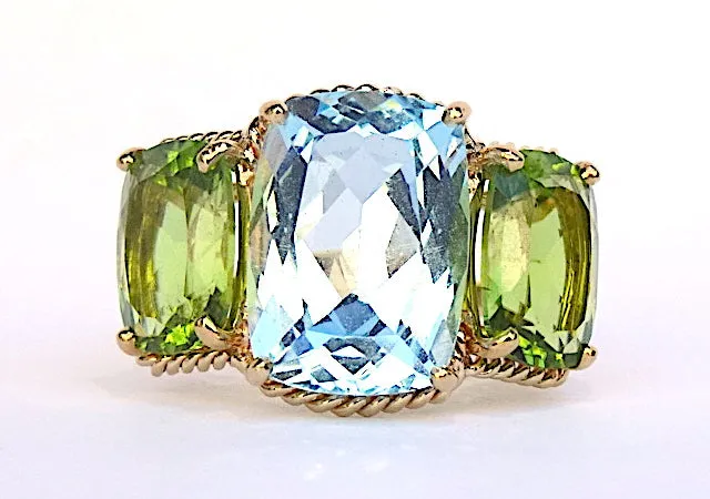 Elegant Three-Stone Ring with Gold Rope Twist Border with Blue Topaz and Peridot