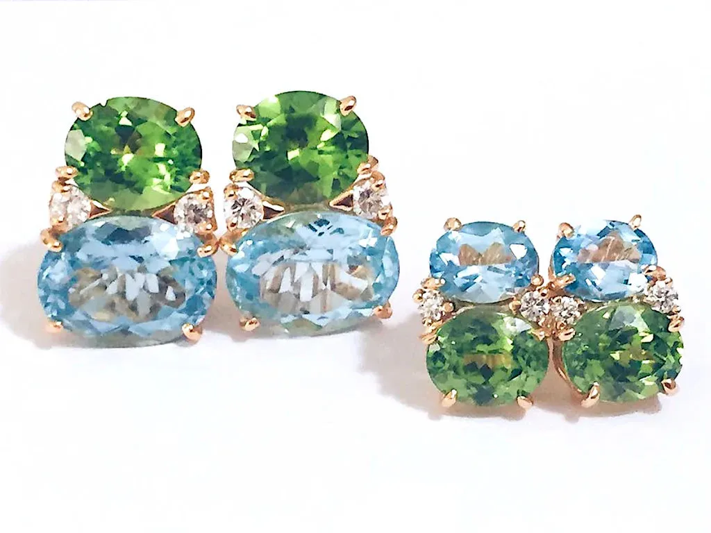 Elegant Three-Stone Ring with Gold Rope Twist Border with Blue Topaz and Peridot