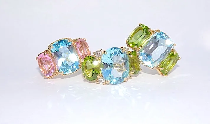 Elegant Three-Stone Ring with Gold Rope Twist Border with Blue Topaz and Peridot