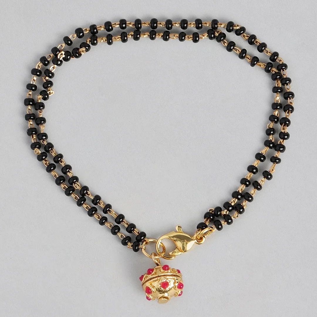 Estele Gold Plated Beautiful Black Beads Bracelet with Ruby Stones for Women