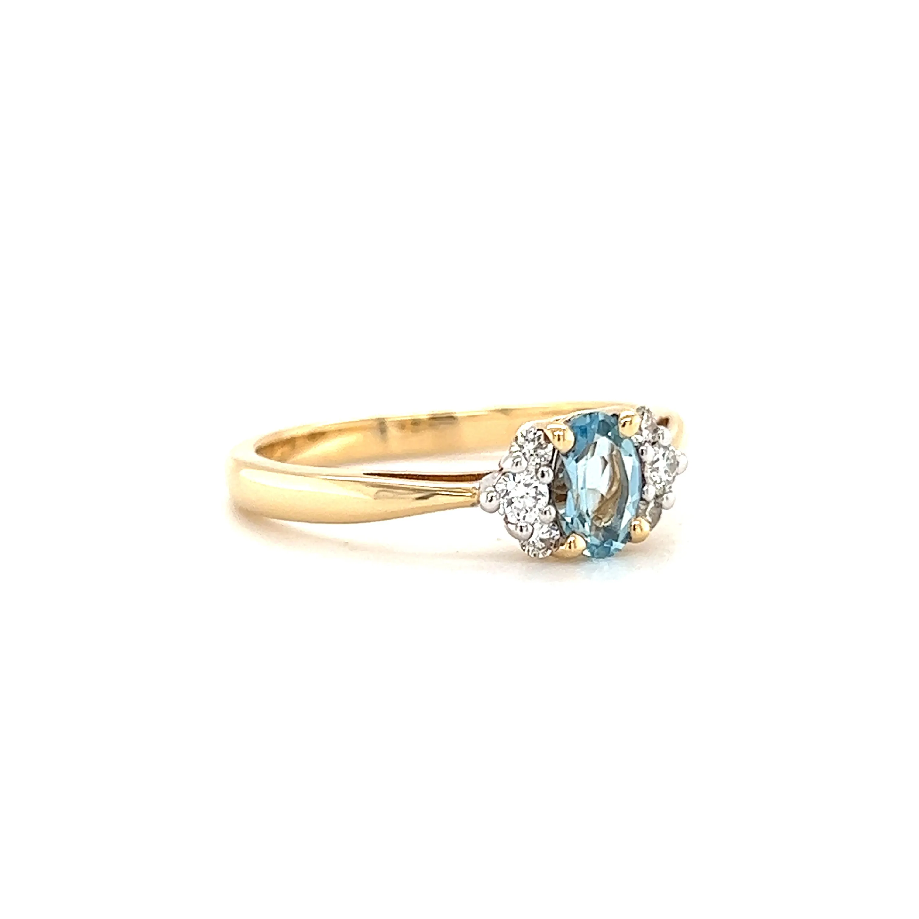 Oval Aquamarine Ring with Six Side Diamonds in 14K Yellow Gold