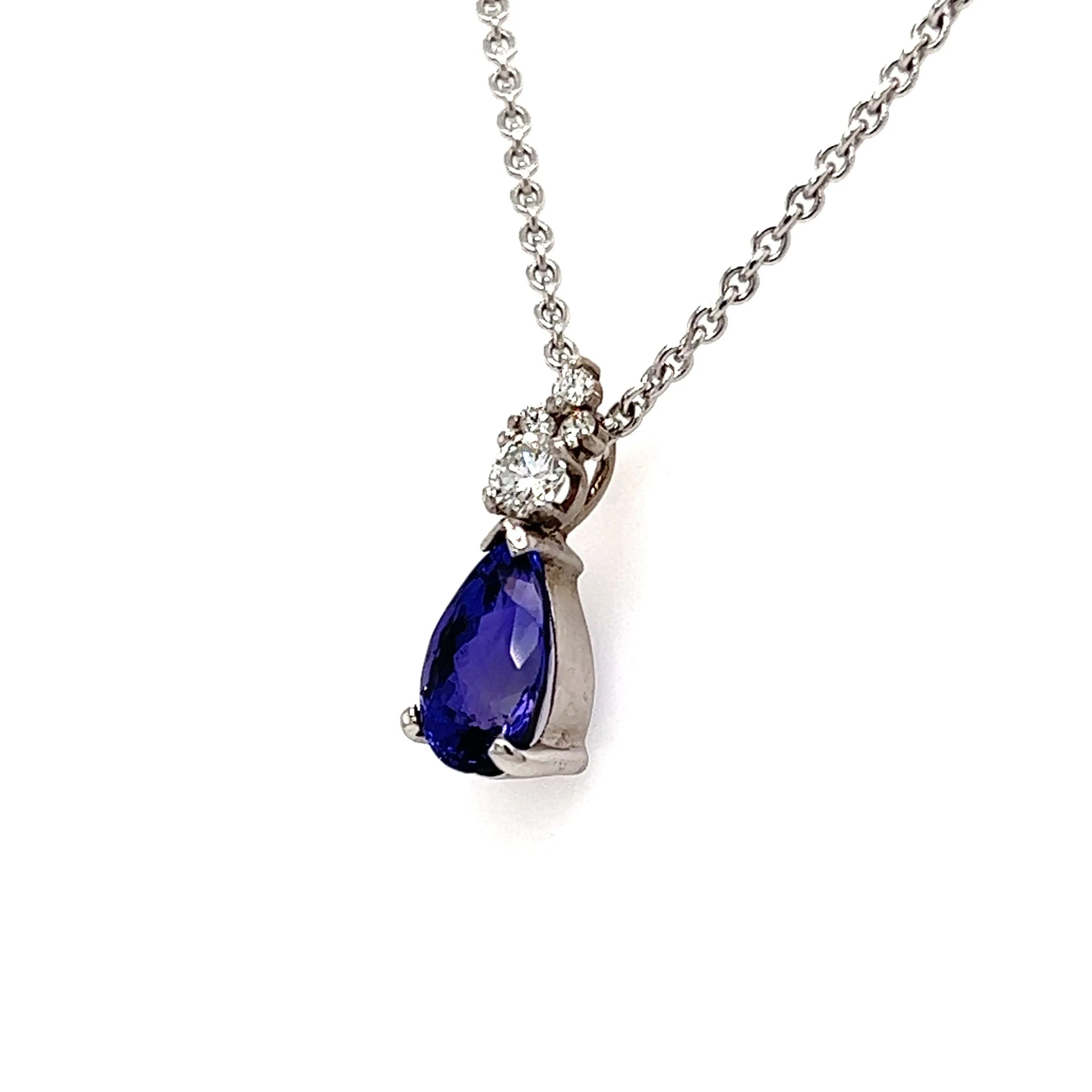 Pear Tanzanite Pendant with Four Diamonds in Platinum and 14K White Gold